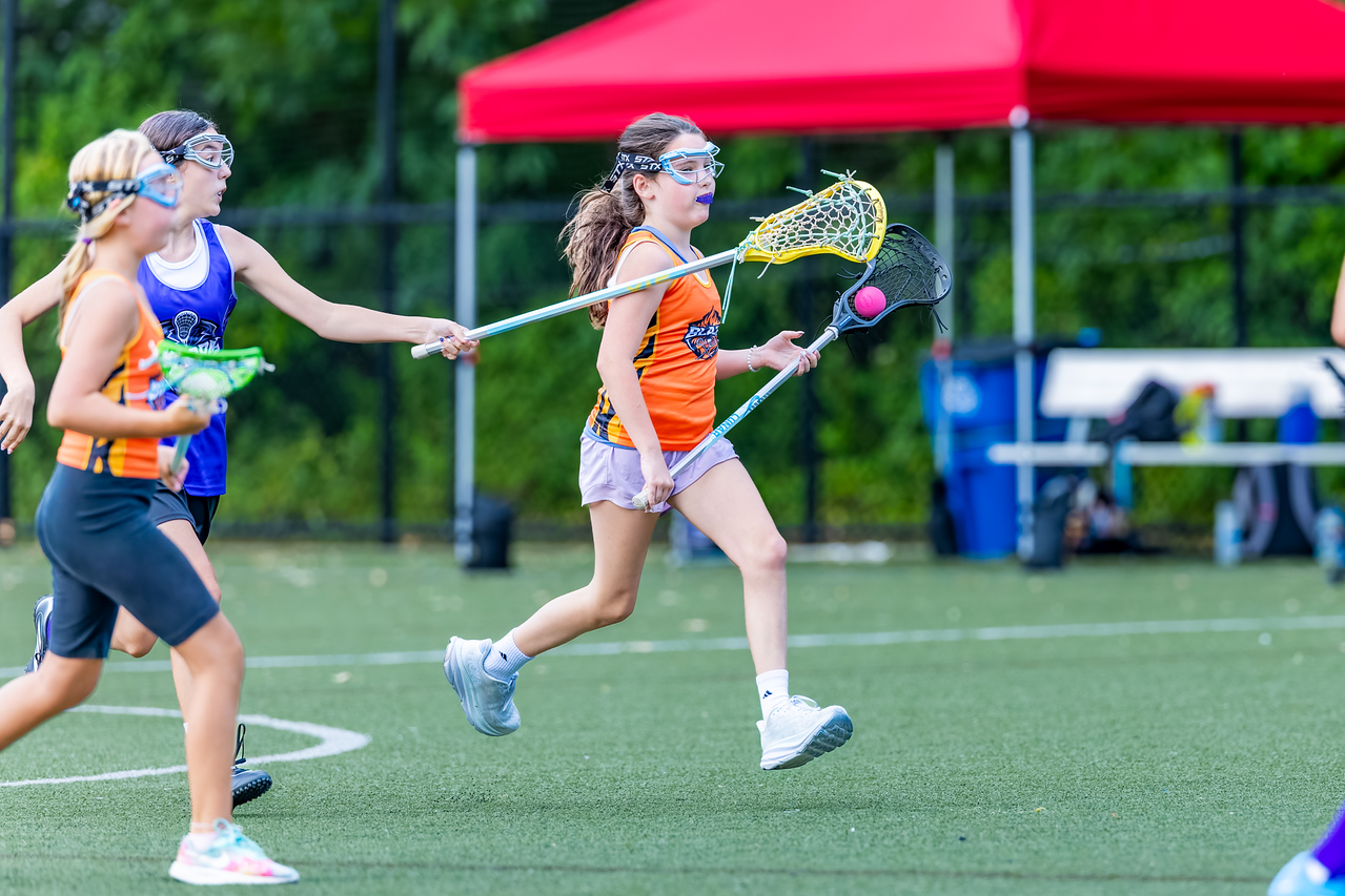 A Blaze player competing on the turf