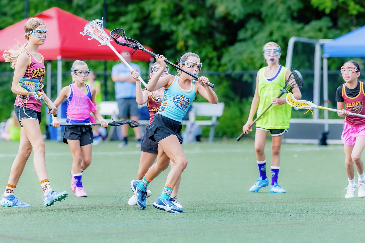 A Tide player competing on the turf